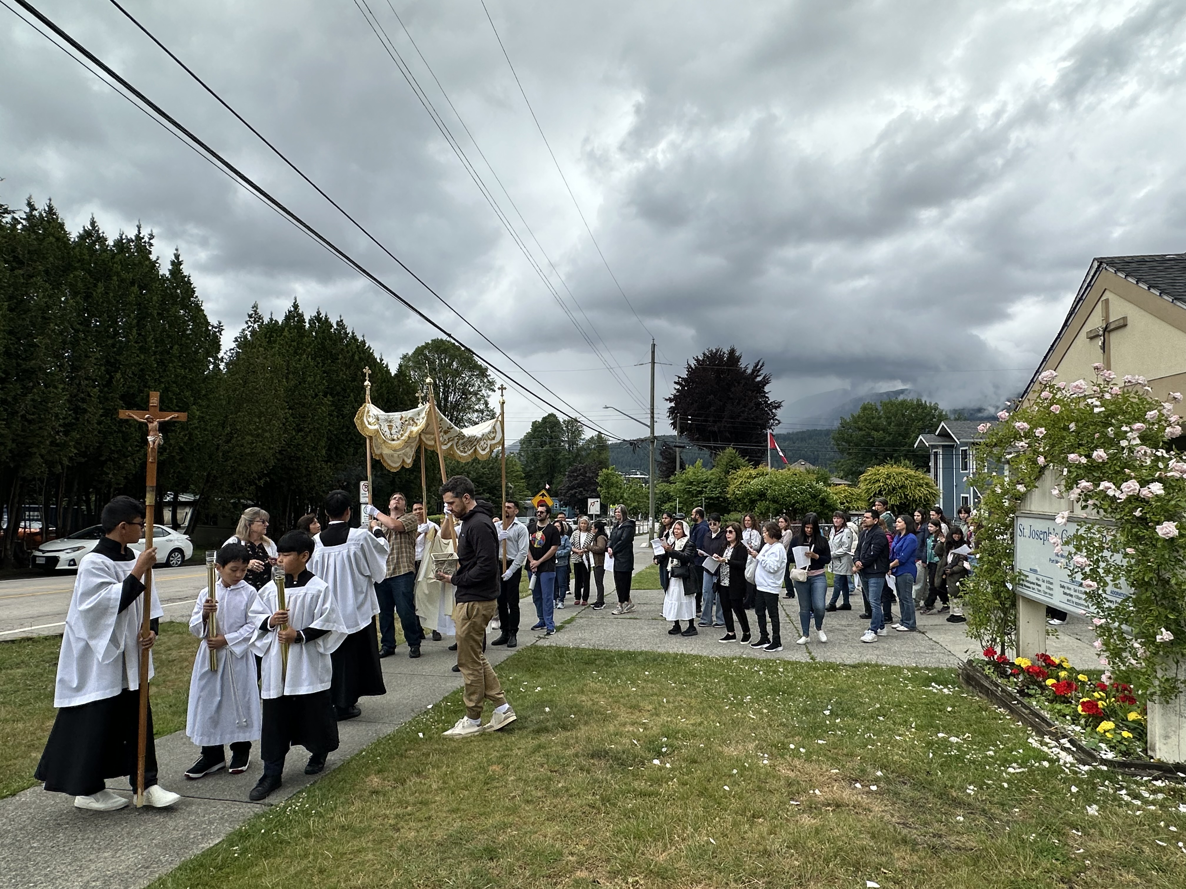 Parishioners gathering outside St. Joseph Parish for the Corpus Christi procession