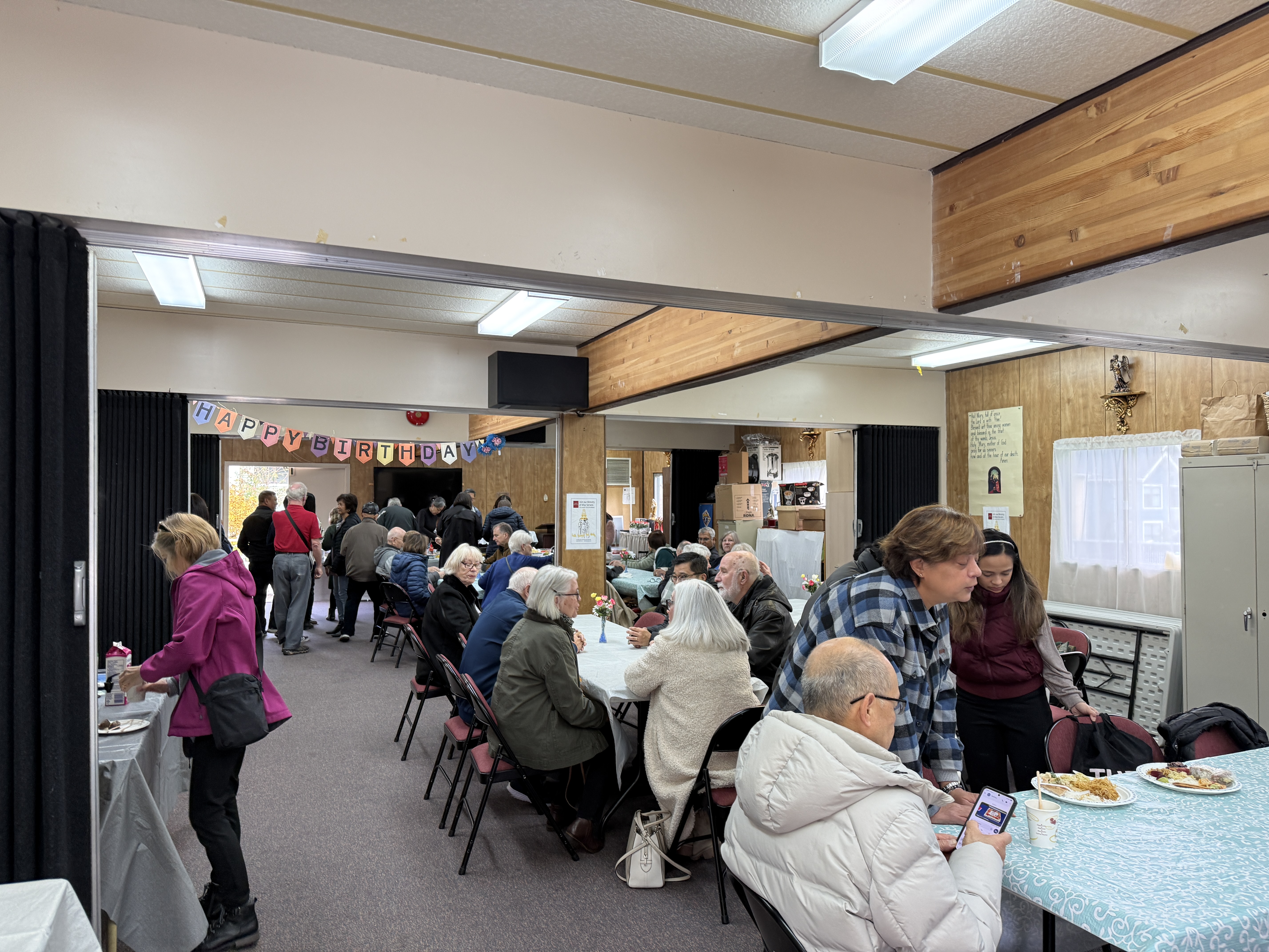 Portable full of parishioners enjoying brunch