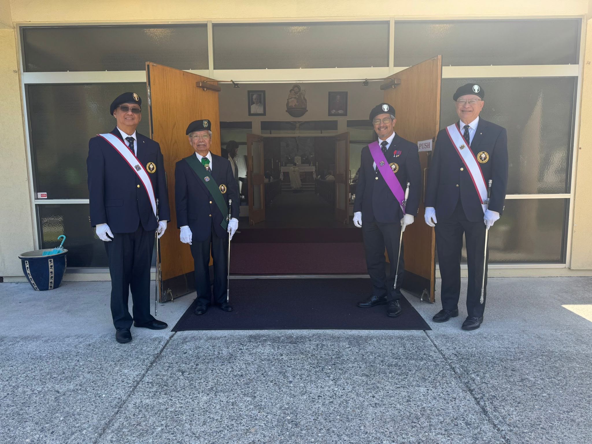 Knights of Columbus honour guard standing at the doors of St. Joseph Parish