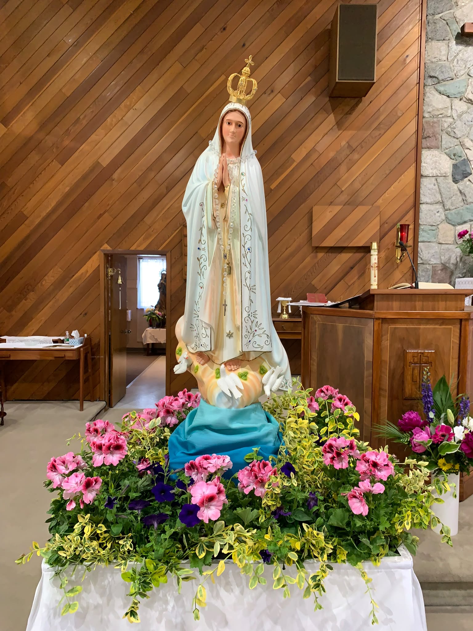 Mary's statue prepared with flowers for the Marian Procession