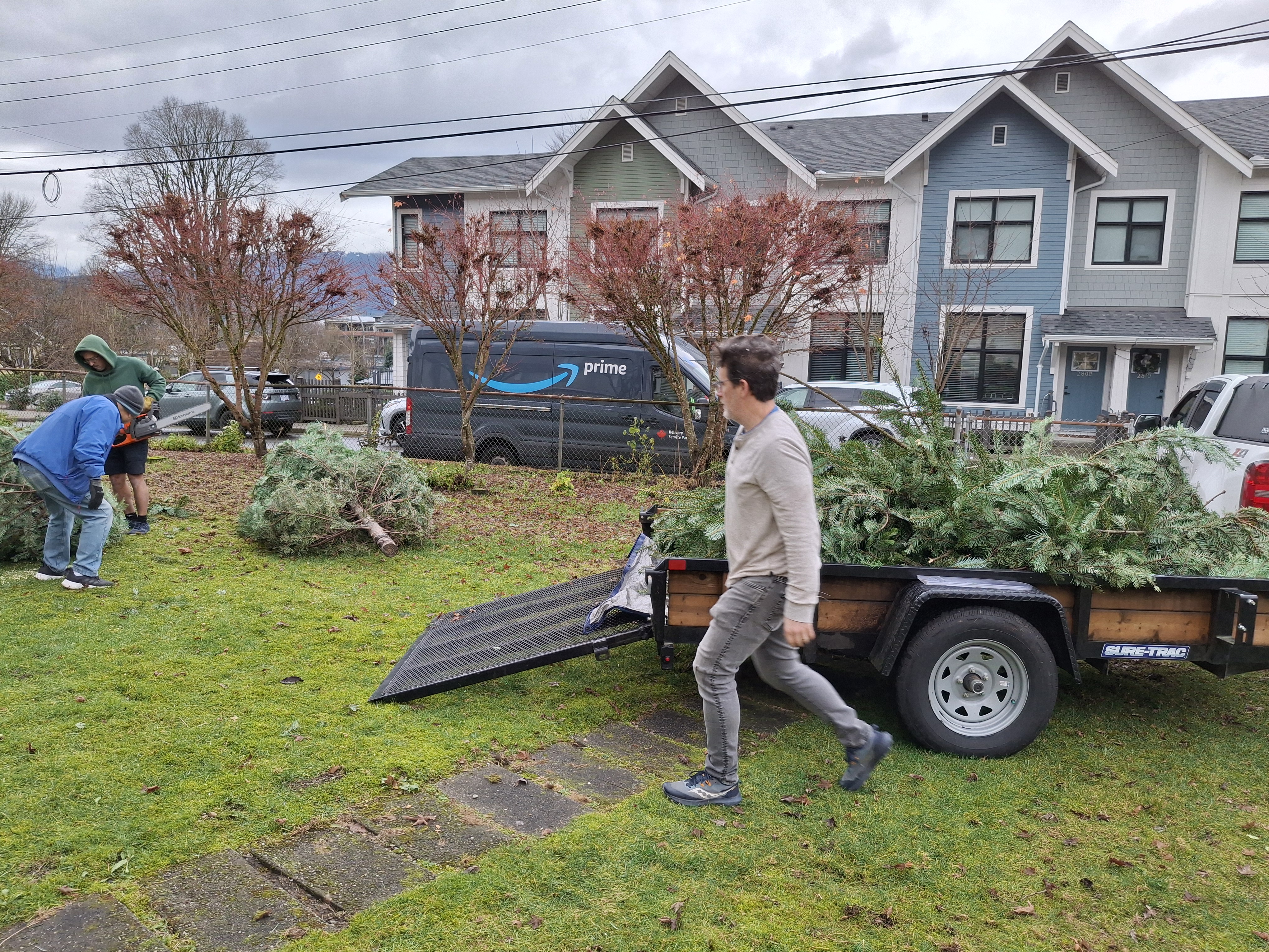 Moving the trees out with steady teamwork.